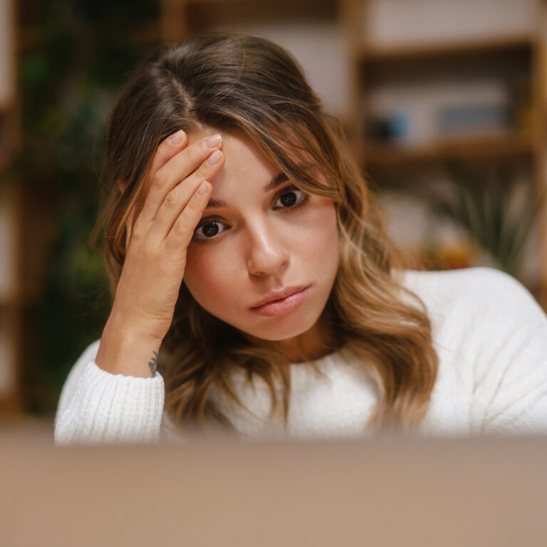 Frustrated confused young woman manager