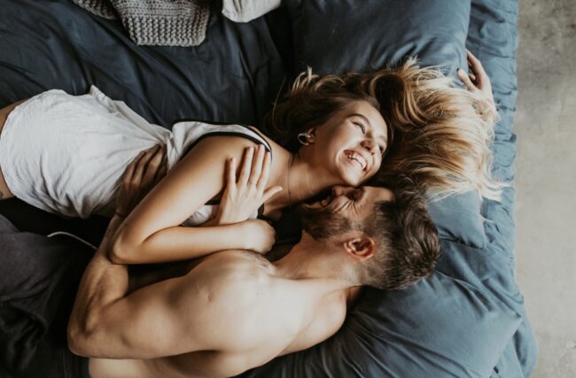 stock-photo-beautiful-loving-couple-kissing-in-bed-1224351475-transformed