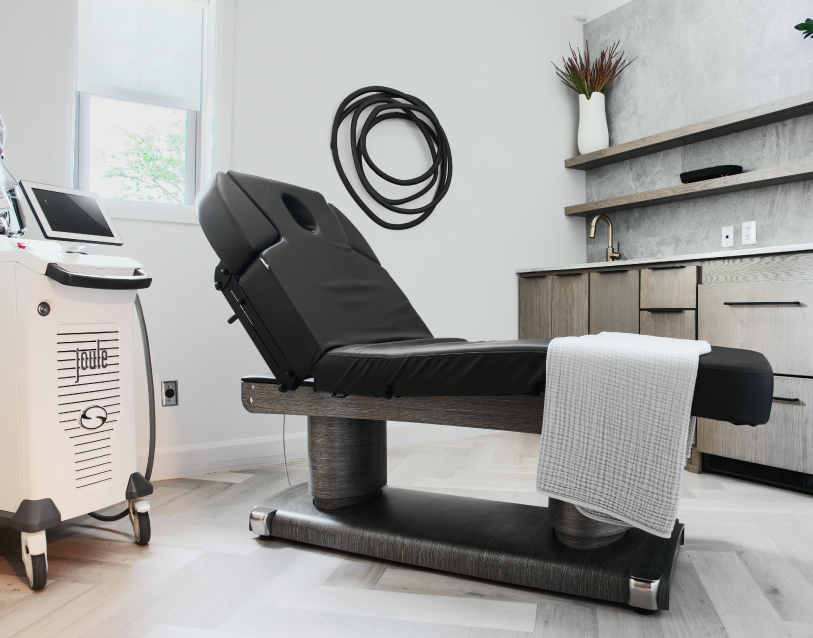 Modern med spa treatment room with Halo laser equipment in Westerville, Ohio, designed for luxury aesthetic care.