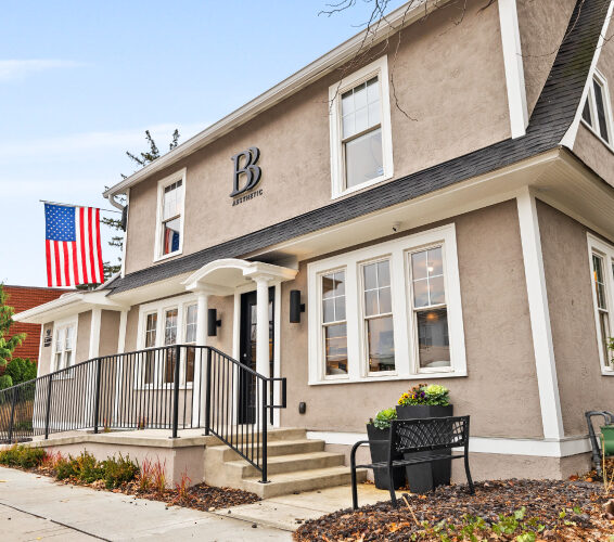 Exterior view of BB Aesthetic medspa in Westerville, Ohio with American flag.