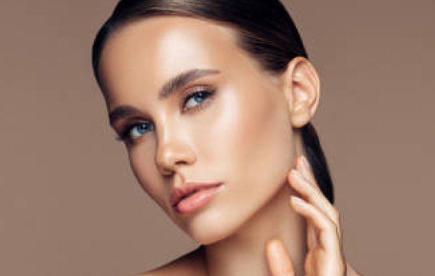 Young blonde woman with flawless, smooth skin representing skin rejuvenation treatments at Columbus medical spa.